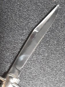 Vintage Shur Snap Bowtie Fishtail switchblade. Vintage Shur Snap Bowtie Fishtail switchblade.