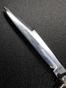 Vintage Shur Snap Bowtie Fishtail switchblade. Vintage Shur Snap Bowtie Fishtail switchblade.