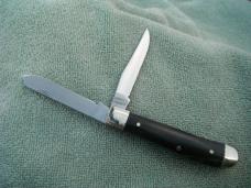 NIB/NOS Smith & Wesson SW1020 Black Trapper 2 Blade W/ Horn Handles pocket knife NIB/NOS Smith & Wesson SW1020 Black Trapper 2 Blade W/ Horn Handles pocket knife