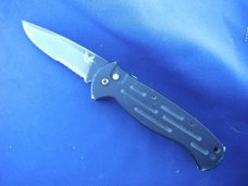 Discontinued Benchmade A.F.O. Automatic Black Blade Combo Edge w/ Safety - 9050SBK Made in the USA!! Discontinued Benchmade A.F.O. Automatic Black Blade Combo Edge w/ Safety - 9050SBK Made in the USA!!