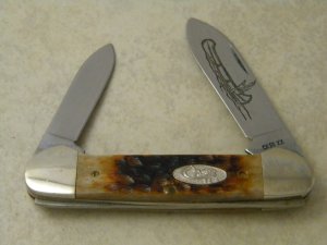 Case XX USA 1 Dot  Jigged Bone 62131 Etched Canoe Knife