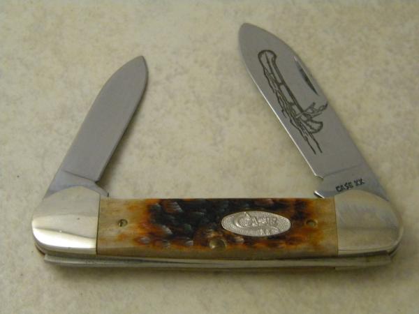 Case XX USA 1 Dot Jigged Bone 62131 Etched Canoe Knife Case XX USA 1 Dot Jigged Bone 62131 Etched Canoe Knife