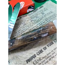 gorgeous case trapper with exotic mammoth ivory handles, near mint, fully worked gorgeous case trapper with exotic mammoth ivory handles, near mint, fully worked