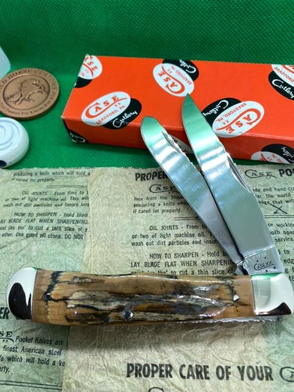 gorgeous case trapper with exotic mammoth ivory handles, near mint, fully worked gorgeous case trapper with exotic mammoth ivory handles, near mint, fully worked