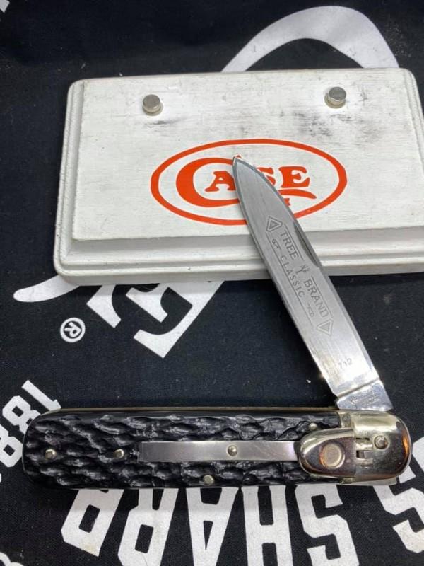 Boker Auto, 712. fires hard, no peak. tiny bottom pinner. never used
