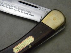 Puma Germany 970 Plainsman 1970 Jacaranda Wood Large Lockback Knife NIB Puma Germany 970 Plainsman 1970 Jacaranda Wood Large Lockback Knife NIB