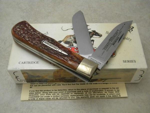 Winchester Trademark USA 1993 Burnt Orange Bone 29103 Cartridge Series Jumbo Trapper Knife in Box Winchester Trademark USA 1993 Burnt Orange Bone 29103 Cartridge Series Jumbo Trapper Knife in Box