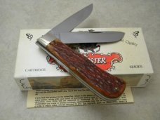 Winchester Trademark USA 1993 Burnt Orange Bone 29103 Cartridge Series Jumbo Trapper Knife in Box Winchester Trademark USA 1993 Burnt Orange Bone 29103 Cartridge Series Jumbo Trapper Knife in Box