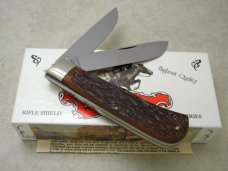 Winchester Trademark USA 1992 Burnt Orange Bone 29103 1/2 Rifle Series Jumbo Trapper Knife in Box Winchester Trademark USA 1992 Burnt Orange Bone 29103 1/2 Rifle Series Jumbo Trapper Knife in Box