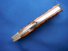 Custom hand made Lock-back folding Knife, jigged bone scales, by Robert E Purvis. Made in the USA! Custom hand made Lock-back folding Knife, jigged bone scales, by Robert E Purvis. Made in the USA!
