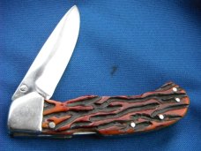 Custom hand made Lock-back folding Knife, jigged bone scales, by Robert E Purvis. Made in the USA! Custom hand made Lock-back folding Knife, jigged bone scales, by Robert E Purvis. Made in the USA!
