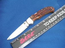 Custom hand made Lock-back folding Knife, jigged bone scales, by Robert E Purvis. Made in the USA! Custom hand made Lock-back folding Knife, jigged bone scales, by Robert E Purvis. Made in the USA!