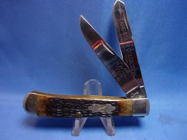 Case XX 6254 SS Jigged Bone Trapper 50 Cent Tang Stamp Collection