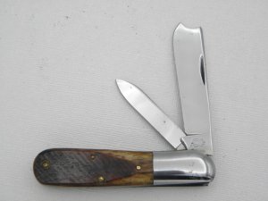 Queen Cutlery #25 Barlow with saw cut bone:  3 1/2” closed, late 1940s, no etched blade, Big “Q” 