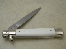 Italy Swivel Bolster Release 8.75 White Italian Stiletto Switchblade Knife c.1970's or 1980's Italy Swivel Bolster Release 8.75 White Italian Stiletto Switchblade Knife c.1970's or 1980's