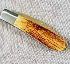 Steve Vanderkolff Mammoth Ivory,4" swayback, he uses dot system for pulls. CPM-154, diamond shield 