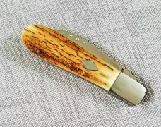 Steve Vanderkolff Mammoth Ivory,4" swayback, he uses dot system for pulls. CPM-154, diamond shield 