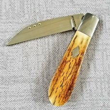 Steve Vanderkolff Mammoth Ivory,4" swayback, he uses dot system for pulls. CPM-154, diamond shield 