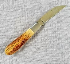 Steve Vanderkolff Mammoth Ivory,4" swayback, he uses dot system for pulls. CPM-154, diamond shield 
