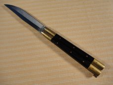 HORN AND BRASS BUTTERFLY KNIFE HORN AND BRASS BUTTERFLY KNIFE
