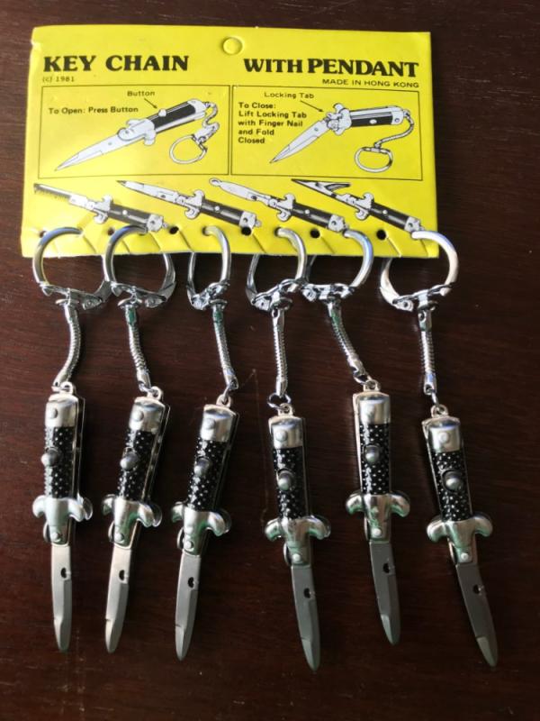 Miniature Switchblade Stiletto's, Made in Hong Kong, With Original Retail Advertisement Hanger Miniature Switchblade Stiletto's, Made in Hong Kong, With Original Retail Advertisement Hanger