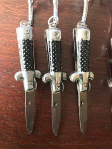 Miniature Switchblade Stiletto's, Made in Hong Kong, With Original Retail Advertisement Hanger Miniature Switchblade Stiletto's, Made in Hong Kong, With Original Retail Advertisement Hanger