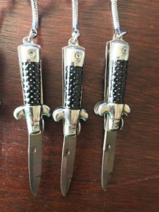 Miniature Switchblade Stiletto's, Made in Hong Kong, With Original Retail Advertisement Hanger Miniature Switchblade Stiletto's, Made in Hong Kong, With Original Retail Advertisement Hanger