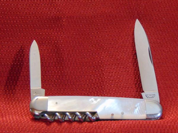 VINTAGE OLD E.BRUCKMANN GERMANY CHAMPAGNE KNIFE GENUINE FIREY PEARL 1891/1956 VINTAGE OLD E.BRUCKMANN GERMANY CHAMPAGNE KNIFE GENUINE FIREY PEARL 1891/1956
