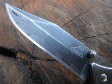 Gerber Folding Pocket Knife, lightweight handle/scales.    Super  Sharp edge!!!!