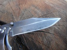 Gerber Folding Pocket Knife, lightweight handle/scales.    Super  Sharp edge!!!!