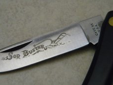 Case XX Stainless USA 3 Dot (1977) Black 2138 "Cale Yarborough 1976" Champion Etch Sodbuster Knife Case XX Stainless USA 3 Dot (1977) Black 2138 "Cale Yarborough 1976" Champion Etch Sodbuster Knife