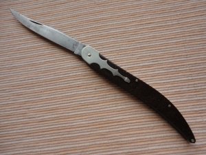 UNION CUTLERY CO OLEAN NY USA DARK AMBER GLITTER CELLULOID BARN DOOR HINGE TOOTHPICK c. 1923-51