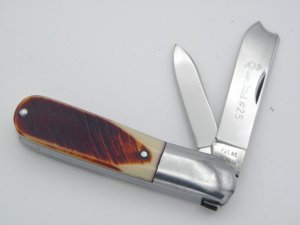 Queen Cutlery #25 Barlow burnt orange saw cut imitation bone:  3 1/2” closed, late 1950s, 