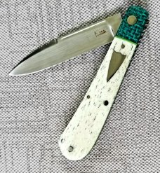 K'roo Custom Giraffe Bone Zulu Knife,NEW,W/ slip, 4".. real micarta....liners..spacers..filework K'roo Custom Giraffe Bone Zulu Knife,NEW,W/ slip, 4".. real micarta....liners..spacers..filework