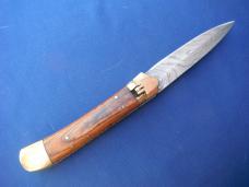 Beautiful Damascus Automatic Knife. Excellent condition, beautiful scales! Striking Damascus pattern Beautiful Damascus Automatic Knife. Excellent condition, beautiful scales! Striking Damascus pattern