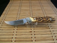 SCHRADE USA 162 DU WOLVERINE HIGH CARBON STEEL VINTAGE FIXED BLADE HUNTING KNIFE WITH STAGLON SCALES SCHRADE USA 162 DU WOLVERINE HIGH CARBON STEEL VINTAGE FIXED BLADE HUNTING KNIFE WITH STAGLON SCALES