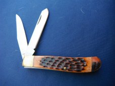 NOS/NIB Pine Knot mini trapper pocket knife Brown Jigged Bone #pk0007Br NOS/NIB Pine Knot mini trapper pocket knife Brown Jigged Bone #pk0007Br