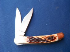 NOS/NIB Pine Knot Brand Copperhead Pocket Knife Brown Jigged Bone. New in Box NOS/NIB Pine Knot Brand Copperhead Pocket Knife Brown Jigged Bone. New in Box