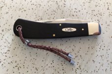 CASE XX 2010 TB71546 BACKPOCKET EBONY POCKET KNIFE w LANYARD/NOS/ “MINT”/ TB = TONY BOSE CASE XX 2010 TB71546 BACKPOCKET EBONY POCKET KNIFE w LANYARD/NOS/ “MINT”/ TB = TONY BOSE