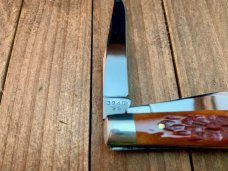 Winchester Stockman 3 1/4” Burnt Orange Jigged Bone 1995 Queen Made Winchester Stockman 3 1/4” Burnt Orange Jigged Bone 1995 Queen Made