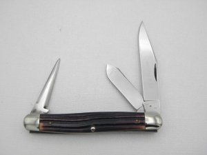 Queen Cutlery Co. #37 Stockman with leather punch in Burnt Orange Imitation Winterbottom Bone: