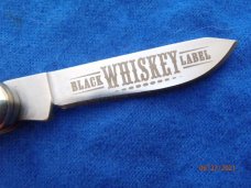 Kissing Crane Stockman with Tennessee Whiskey Advertisement Kissing Crane Stockman with Tennessee Whiskey Advertisement