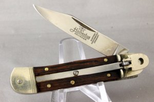 HUBERTUS AUTOMATIC, 3 3/8TH Inches Long, Wood Handles, Fires Hard Locks Up Tight
