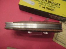 Remington Silver  Bullet 1989 Brown Bone  Trapper Model R1128 