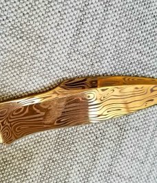 Jerry Moen Full Custom Golden Snake..1 of 1. See coa ...DLC Damasteel Blade. and titanium hamdles Jerry Moen Full Custom Golden Snake..1 of 1. See coa ...DLC Damasteel Blade. and titanium hamdles