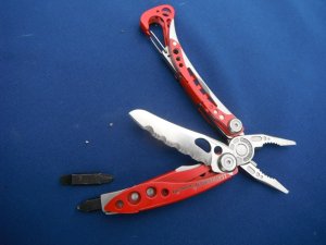 Red Leatherman Skeletool RX  Carabiner Multi-Tool  Pliers, Serrated Knife with Original Nylon Sheath