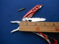 Red Leatherman Skeletool RX Carabiner Multi-Tool Pliers, Serrated Knife with Original Nylon Sheath Red Leatherman Skeletool RX Carabiner Multi-Tool Pliers, Serrated Knife with Original Nylon Sheath