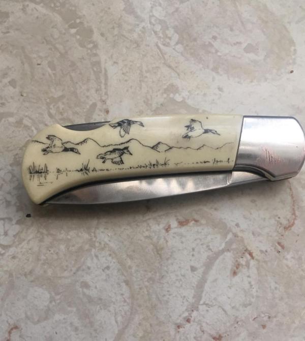 LOCKBACK LOOKS COPY SCHRADE DUCKS