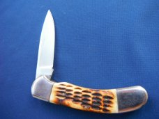 Large Folding slip joint pocket knife with jigged bone scales. Tight blade. Large Folding slip joint pocket knife with jigged bone scales. Tight blade.