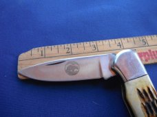 Large Folding slip joint pocket knife with jigged bone scales. Tight blade. Large Folding slip joint pocket knife with jigged bone scales. Tight blade.